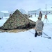 Airmen learn to build Arctic 10-person tents during cold-weather training at Fort McCoy