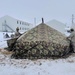 Airmen learn to build Arctic 10-person tents during cold-weather training at Fort McCoy