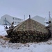 Airmen learn to build Arctic 10-person tents during cold-weather training at Fort McCoy