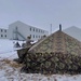 Airmen learn to build Arctic 10-person tents during cold-weather training at Fort McCoy