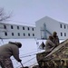 Airmen learn to build Arctic 10-person tents during cold-weather training at Fort McCoy