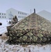 Airmen learn to build Arctic 10-person tents during cold-weather training at Fort McCoy