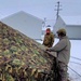 Airmen learn to build Arctic 10-person tents during cold-weather training at Fort McCoy