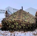 Airmen learn to build Arctic 10-person tents during cold-weather training at Fort McCoy