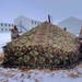 Airmen learn to build Arctic 10-person tents during cold-weather training at Fort McCoy