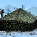 Airmen learn to build Arctic 10-person tents during cold-weather training at Fort McCoy