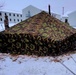 Airmen learn to build Arctic 10-person tents during cold-weather training at Fort McCoy