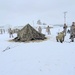 Airmen learn to build Arctic 10-person tents during cold-weather training at Fort McCoy