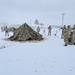 Airmen learn to build Arctic 10-person tents during cold-weather training at Fort McCoy