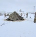 Airmen learn to build Arctic 10-person tents during cold-weather training at Fort McCoy