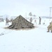 Airmen learn to build Arctic 10-person tents during cold-weather training at Fort McCoy