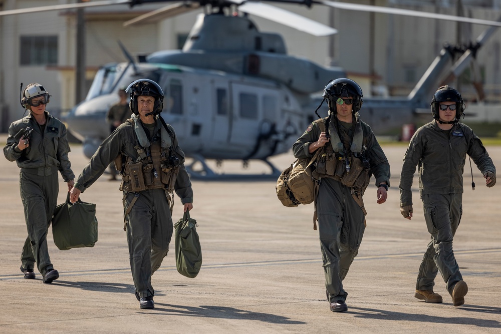 U.S. Marine Corps Brig. Gen. George Rowell flies a UH-1Y attached to HMLA-267