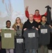 Service Members at Camp Arifjan volunteer at the USO, January, 2023