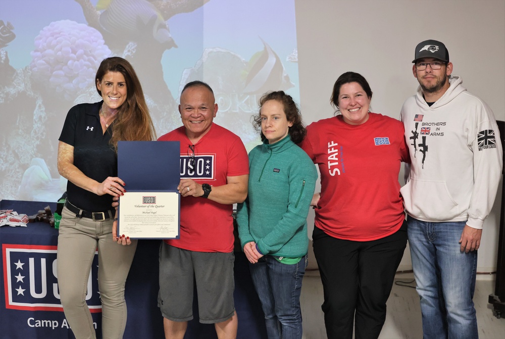 Service Members at Camp Arifjan volunteer at the USO, January, 2023
