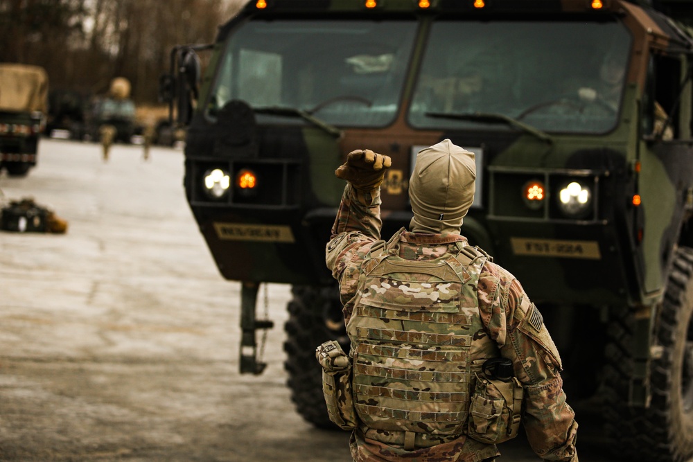 2CR Soldier Guides a Vehicle