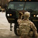 2CR Soldier Guides a Vehicle