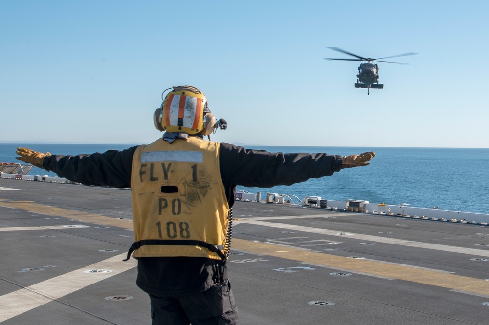 USS Tripoli Conducts Flight Ops with HSC-23 and 16th Combat Aviation Brigade