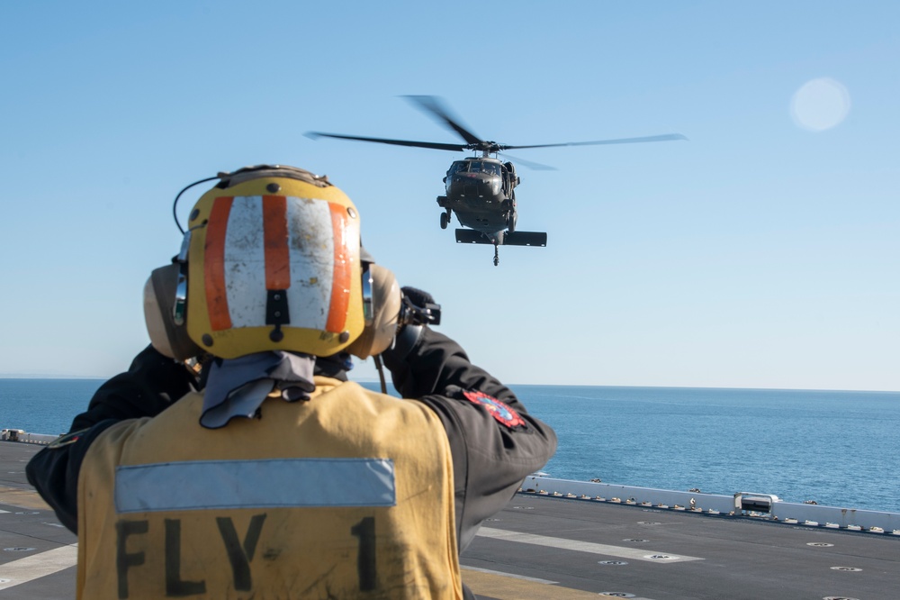 USS Tripoli Conducts Flight Ops with HSC-23 and 16th Combat Aviation Brigade