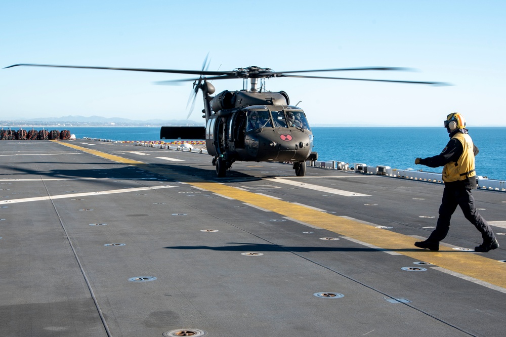 USS Tripoli Conducts Flight Ops with HSC-23 and 16th Combat Aviation Brigade