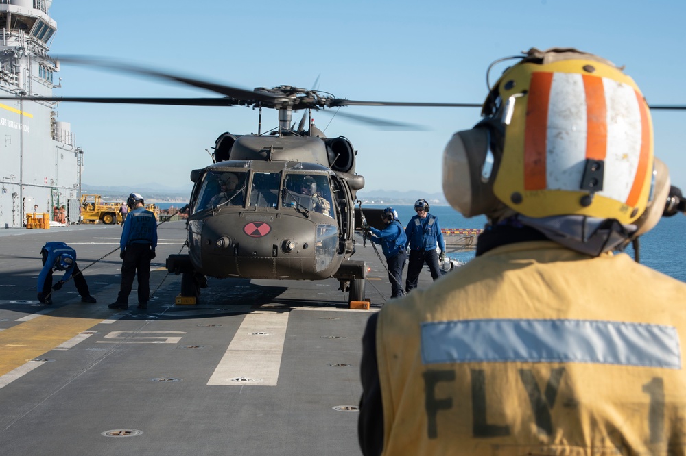 USS Tripoli Conducts Flight Ops with HSC-23 and 16th Combat Aviation Brigade