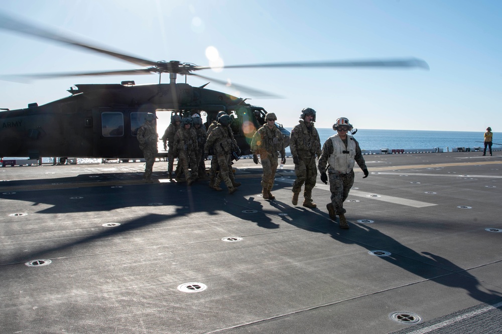 USS Tripoli Conducts Flight Ops with HSC-23 and 16th Combat Aviation Brigade