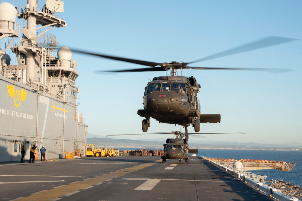 USS Tripoli Conducts Flight Operations the U.S. Army's 16th Combat Aviation Brigade