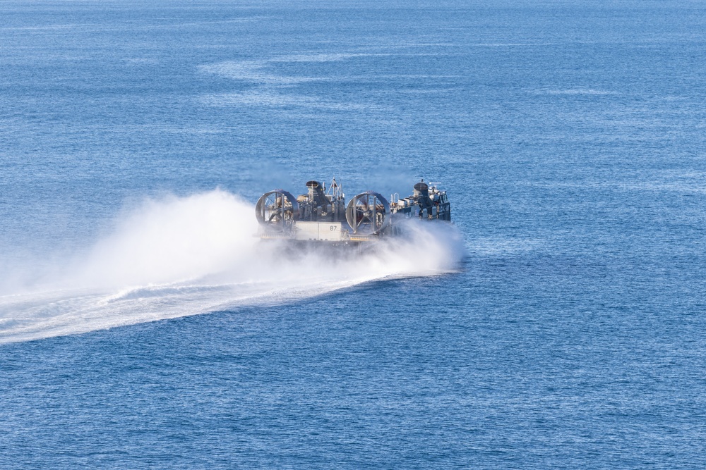 Marines And Sailors Conduct Well Deck Operations Aboard USS Bataan