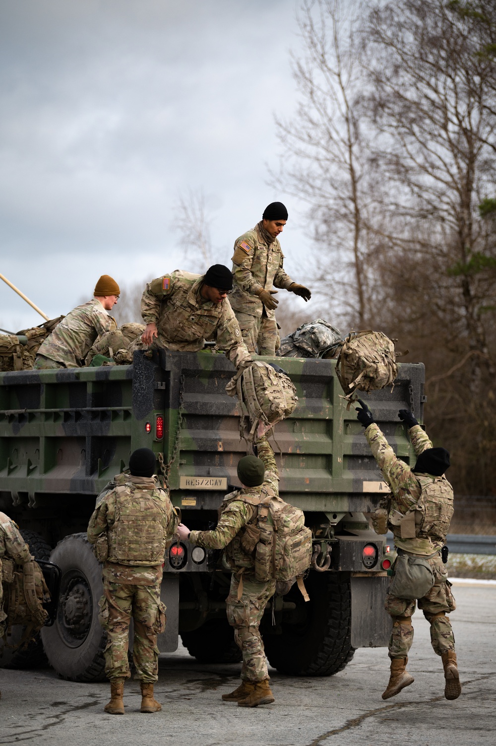 2nd Cavalry Regiment Soldiers Load their Equipment onto a Vehicle