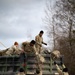 2nd Cavalry Regiment Soldiers Load their Equipment onto a Vehicle