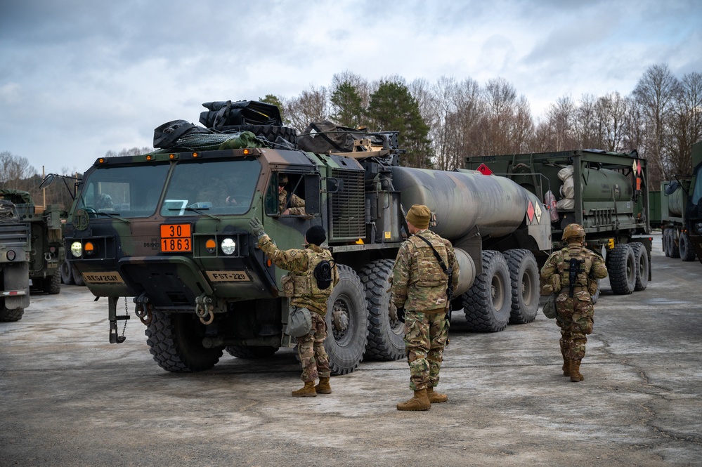 2nd Cavalry Regiment Soldiers Park a Vehicle