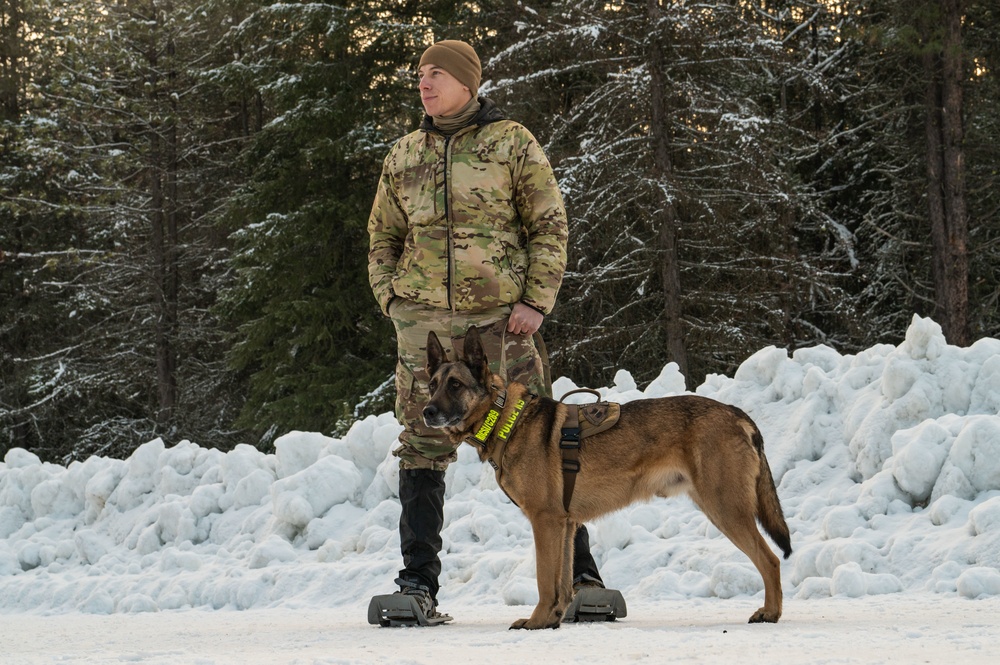 92nd Security Forces Squadron partners with 336th Training Group Survival, Evasion, Resistance, and Escape instructors