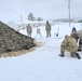 Airmen learn to build Arctic 10-person tents during cold-weather training at Fort McCoy