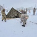 Airmen learn to build Arctic 10-person tents during cold-weather training at Fort McCoy