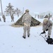 Airmen learn to build Arctic 10-person tents during cold-weather training at Fort McCoy