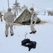 Airmen learn to build Arctic 10-person tents during cold-weather training at Fort McCoy