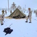 Airmen learn to build Arctic 10-person tents during cold-weather training at Fort McCoy