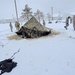 Airmen learn to build Arctic 10-person tents during cold-weather training at Fort McCoy