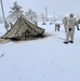 Airmen learn to build Arctic 10-person tents during cold-weather training at Fort McCoy