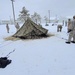 Airmen learn to build Arctic 10-person tents during cold-weather training at Fort McCoy