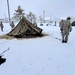 Airmen learn to build Arctic 10-person tents during cold-weather training at Fort McCoy