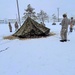 Airmen learn to build Arctic 10-person tents during cold-weather training at Fort McCoy