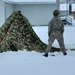 Airmen learn to build Arctic 10-person tents during cold-weather training at Fort McCoy