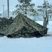 Airmen learn to build Arctic 10-person tents during cold-weather training at Fort McCoy