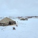 Airmen learn to build Arctic 10-person tents during cold-weather training at Fort McCoy