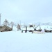 Airmen learn to build Arctic 10-person tents during cold-weather training at Fort McCoy