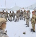 Airmen learn to build Arctic 10-person tents during cold-weather training at Fort McCoy