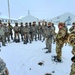 Airmen learn to build Arctic 10-person tents during cold-weather training at Fort McCoy