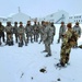 Airmen learn to build Arctic 10-person tents during cold-weather training at Fort McCoy