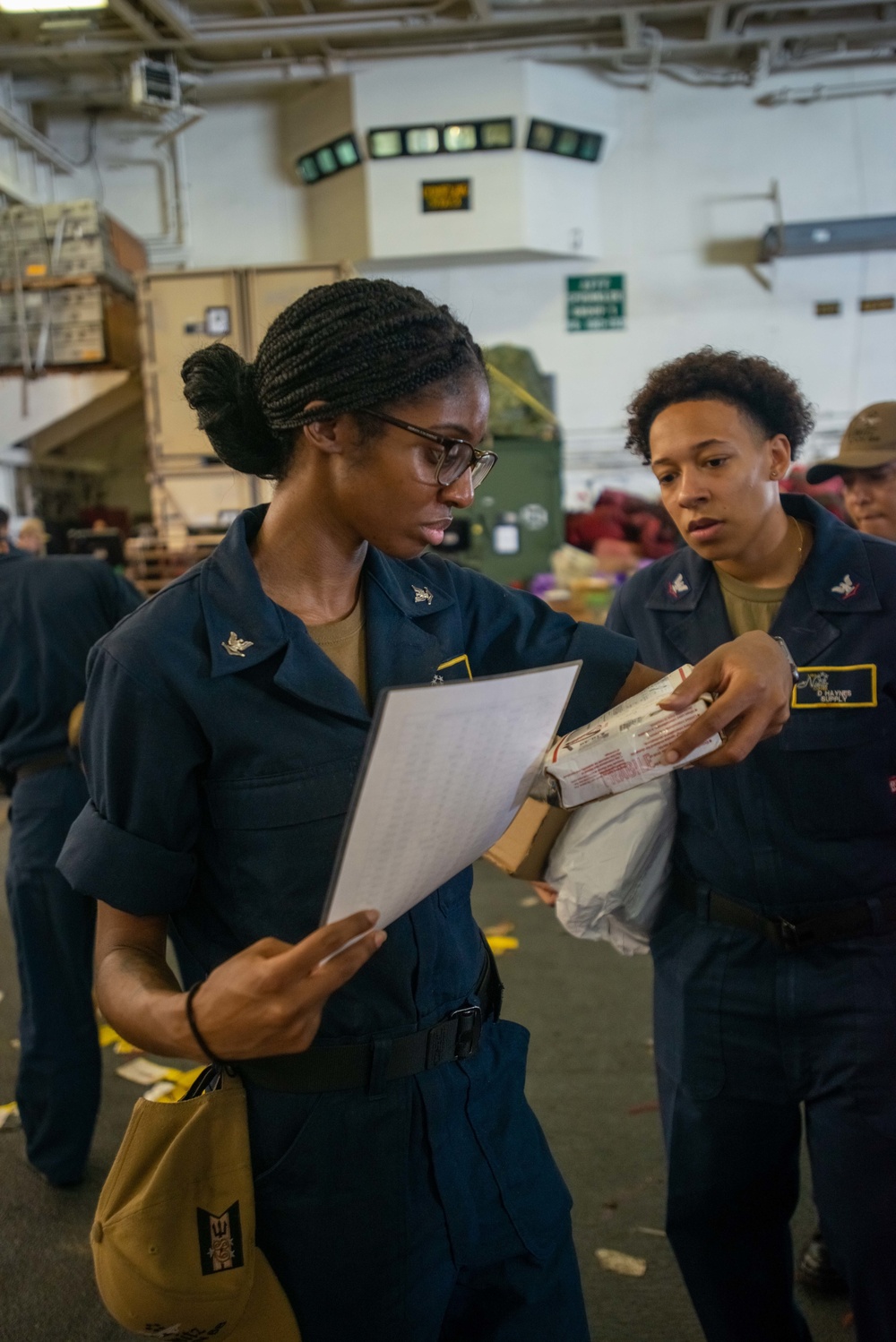 U.S. Navy Sailors Organize And Distribute Mail