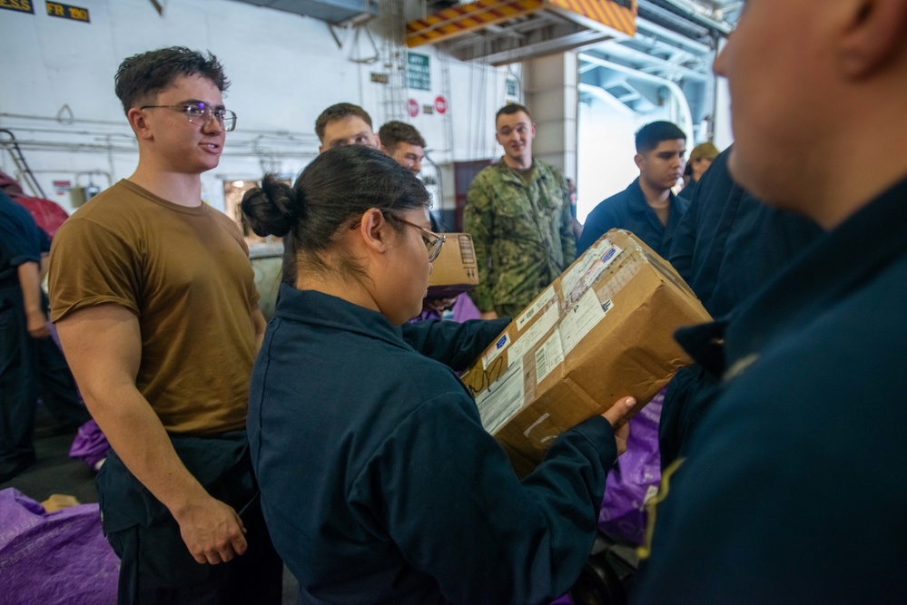 U.S. Navy Sailors Organize And Distribute Mail